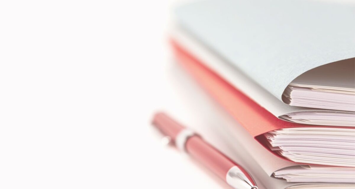 Stack of document folders on the table