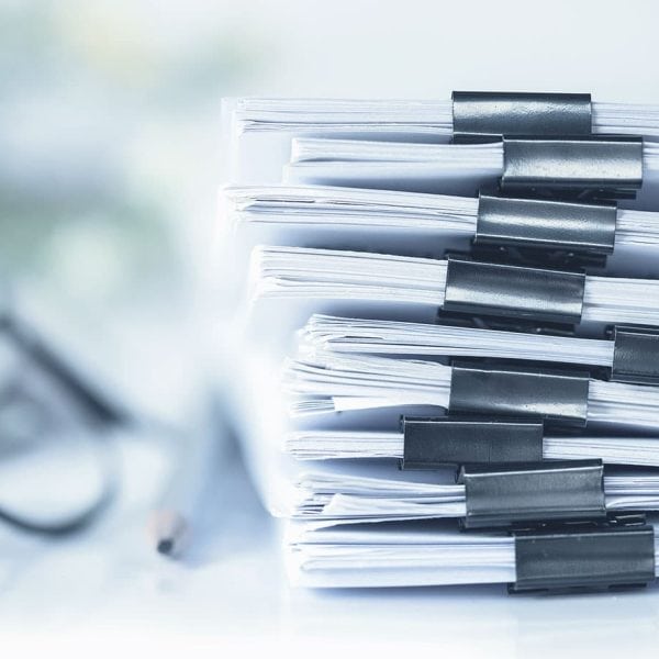 Stack of clippled documents