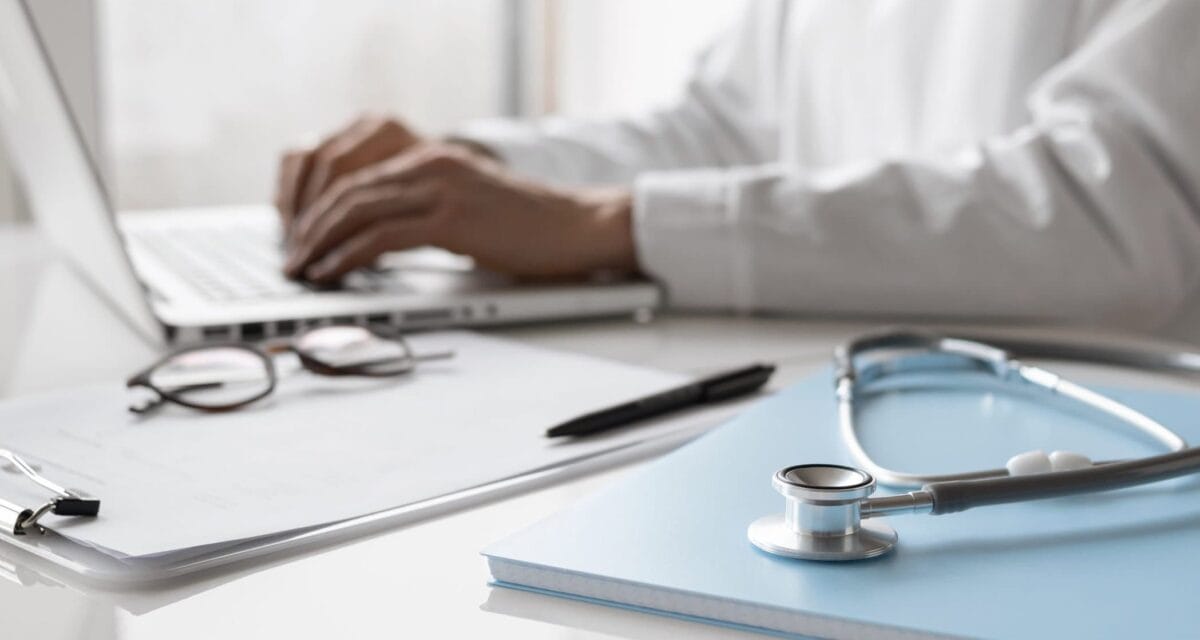 Doctor working on computer